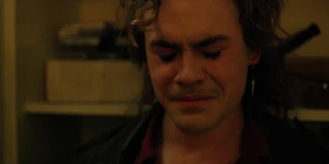 Billy crying after his father leaves his room.