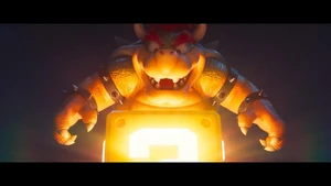 Bowser looks at the ? Block before hitting it with his fist.