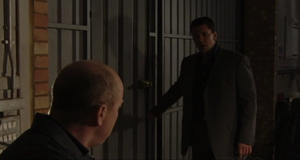 Phil is confronted by Dan as the latter attempts to extort money from him (2001).