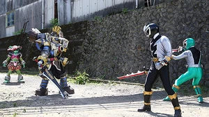 Tankjoh with Kureon facing Ryusoul Black and Green.