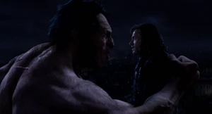 At the edge of the tower, Mr. Hyde lifting Van Helsing up face-to-face before throwing him off the top of Notre Dame.