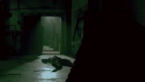 Xavier’s corpse is locked away by Lawrence Gordon with Mark Hoffman.