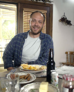 Hatchett smiling at the camera.