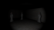 The sheet-covered mannequins with bloody eyes, definitely placed there by Adam for an unknown reason.