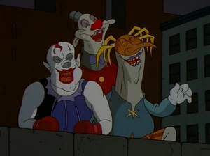 The demonic Ccowns laughing.