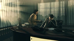 Victor and Marcelo in the former's office.