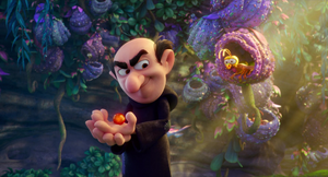 Gargamel holding a ball