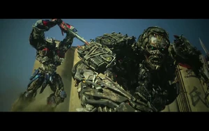 Optimus Prime about to finish off Lockdown.