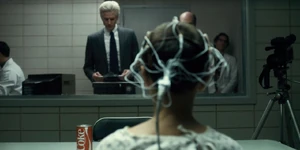 A flashback of Brenner supervising Eleven during a test.