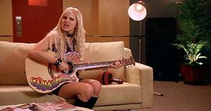 Samantha with her guitar