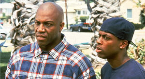 Deebo standing with Smokey.