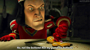 Lord Farquaad grabbing one of Gingy's buttons