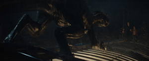 The Indoraptor cornering Owen and Maisie on the roof of the Lockwood Manor.