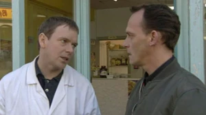 Ian Beale having a dispute with Phil's cousin Billy Mitchell.