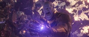 Thanos using the Soul Stone during his fight on Titan.