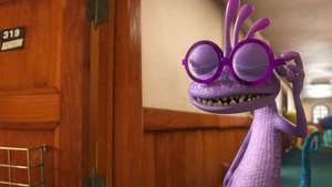 Randall about to take off his glasses.