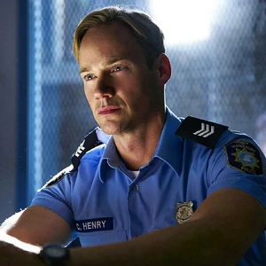 A shot of Cam in the interrogation room.