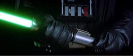 Darth Vader holds Luke's new green lightsaber.