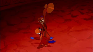 Iago about to knocked unconscious by Abu.