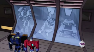 Blitzwing locked up in the Elite Guard flagship alongside Sunstorm and Swindle.