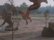 Asmodeus is about to catch Susan before knocking her to the ground.