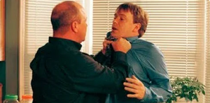 Phil confronts Ian at his house and vows to ruin him out of spite (2000).