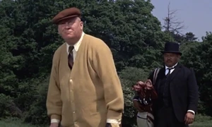 Goldfinger playing golf against Bond.