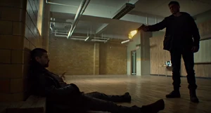 Frank executes Billy "Jigsaw" Russo for his past crimes.