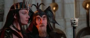 The Grand Vizier reminding Queen Taramis that Jehnna has to be sacrified in the exact moment.