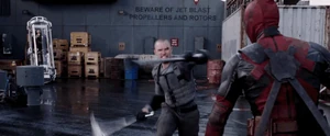 Ajax confronting Deadpool.