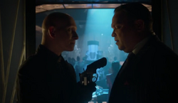 Zsasz provides Butch with an empty gun