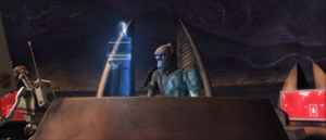 On the Citadel grounds, Warden Osi Sobeck speaks with Count Dooku via hologram.