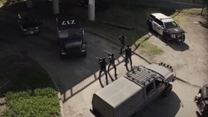 Robbers surrounded by the Texas Rangers and APD.