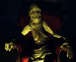 Little Nightmares The Granny.png (1.25 MB) A close-up of the Granny in her chair.