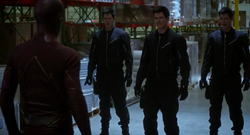 Black and replicas attack Barry.