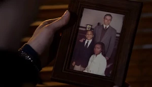 A young Walker and his parents.