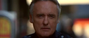 Payne disguised as Police Officer Fisk.