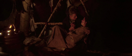 Anakin encountered a bound and emaciated Shmi, who was near death.