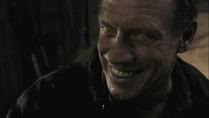 Azazel appearing to Dean in a hallucination.