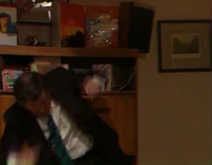 A;an is struck to cabinet when Rita manages to get him off her.