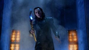 Loki emerges and arrives from a portal created by the Tesseract.