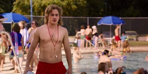 Billy approaching Mrs. Wheeler when she climbs out of the pool.