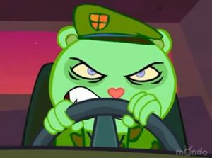 Fliqpy's evil stare as he prepares to kill those crossing a street while driving a truck carrying radioactive waste.