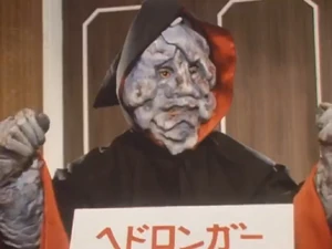 Hedoronger seated at a meeting of the Monster Clan executives.