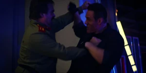 Grigori fighting Hopper outside of the base's control room.