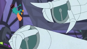 The mecha flicking Perry out from the building.