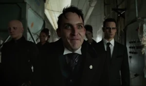 Penguin welcomes the sight of the dead Red Hood Gang