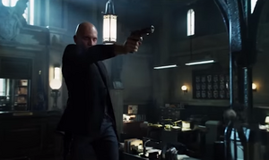 Zsasz fights Gordon at the precinct