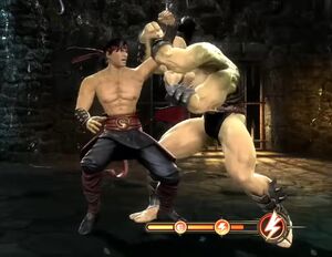 Goro blocks Liu Kang's fist