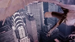 Q attacking the gunmen on the Chrysler Building after her baby is killed.